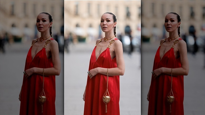 woman wearing chic minimalist red dress