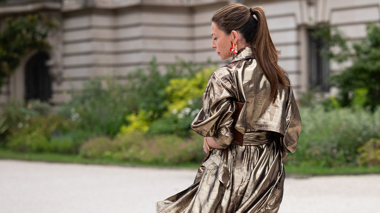 woman wearing shimmery metallic outfit