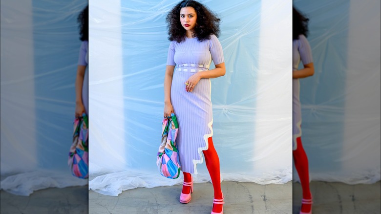 A woman wearing bright red tights