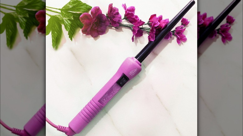 Purple curling wand with flowers