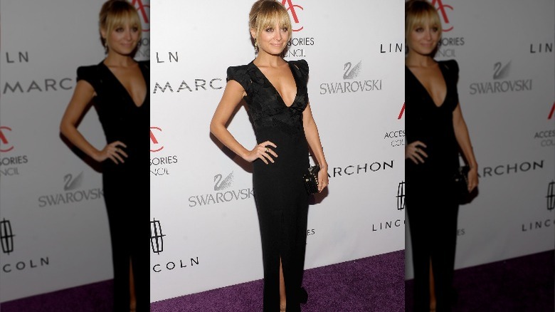 Nicole Richie in a long black dress