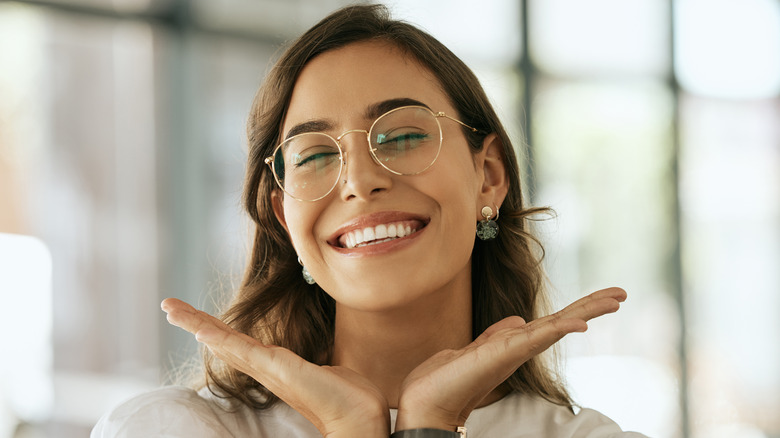 A woman wearing glasses