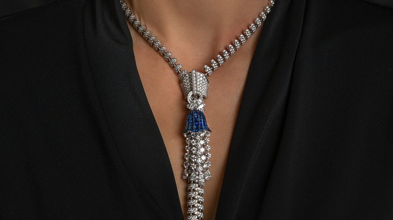 Woman wearing unique silver necklace
