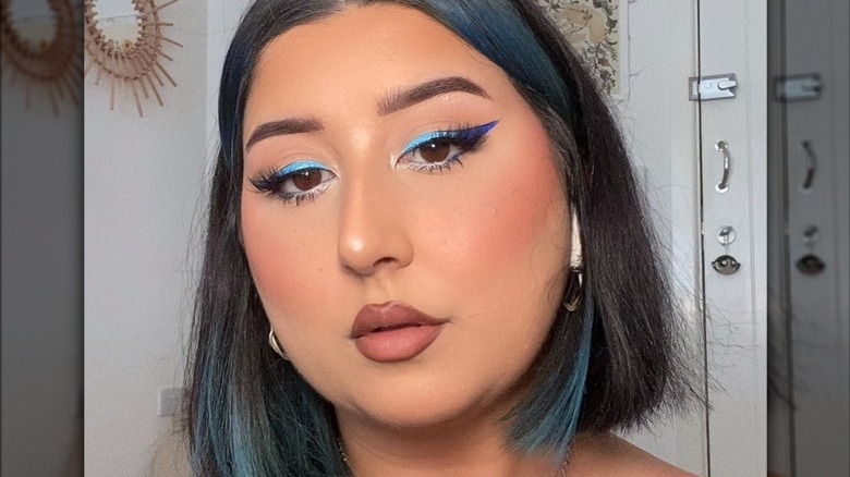 woman with blue makeup