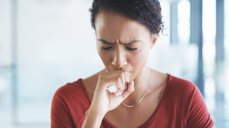 Woman feeling unwell