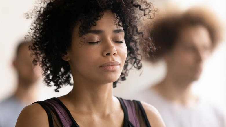 Woman practicing meditation