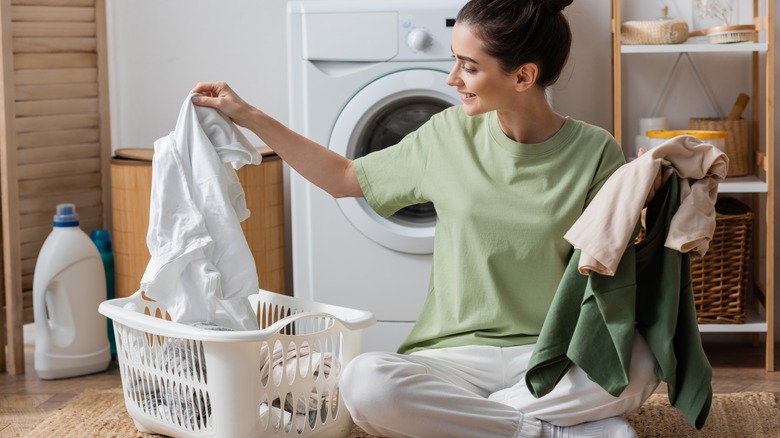 woman sorting laundry