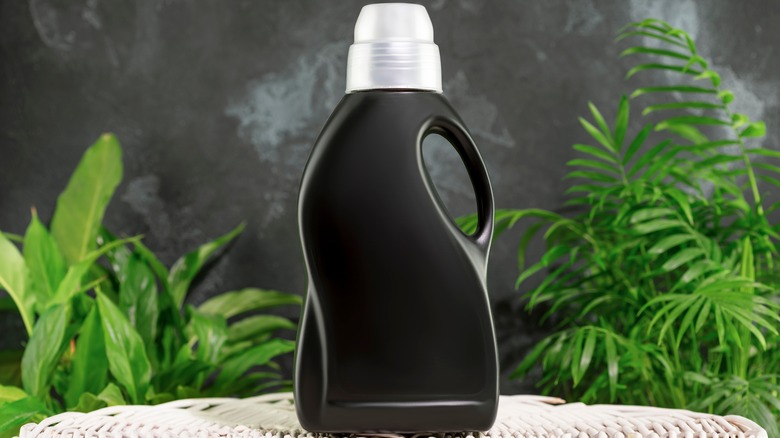 black detergent bottle