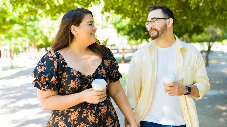 couple walking hand in hand