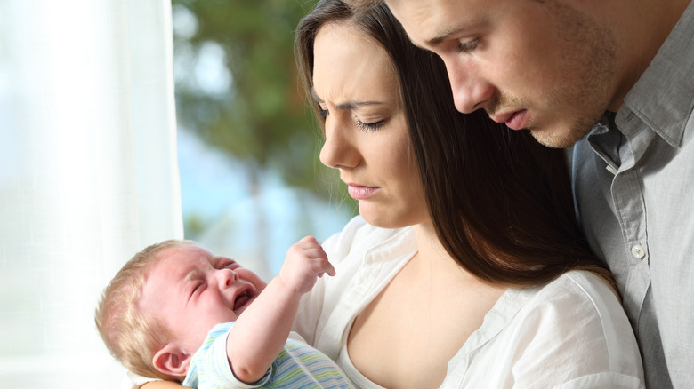 Parents struggling to soothe crying baby