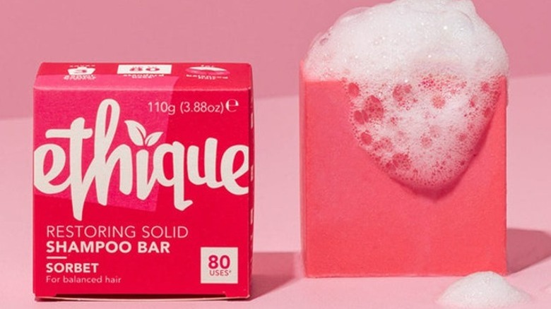 Pink bar of soapy shampoo