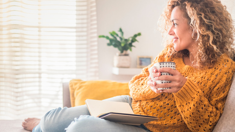 Woman drinking tea in the morning 