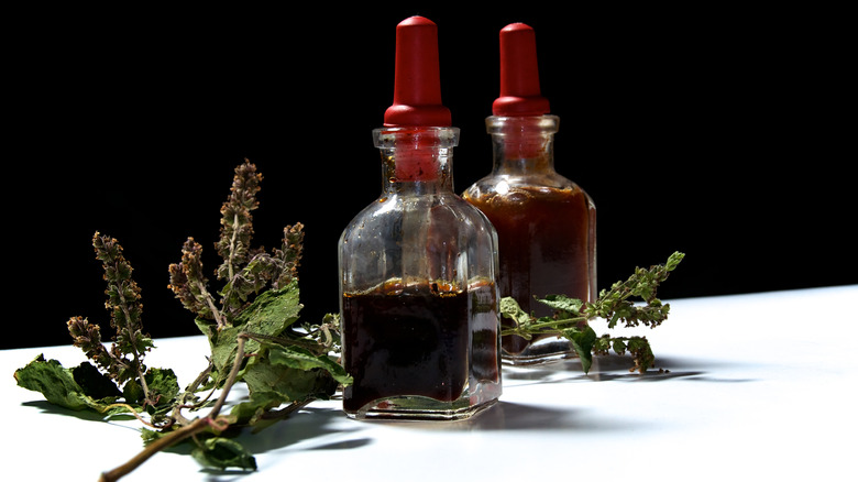 Two bottles of patchouli oil