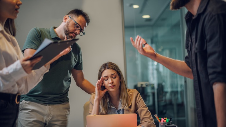 Stressed woman at work 