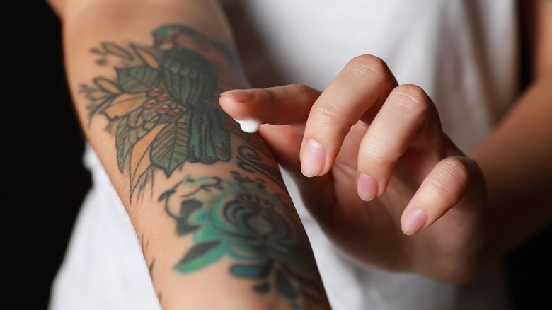 woman with colorful tattoo