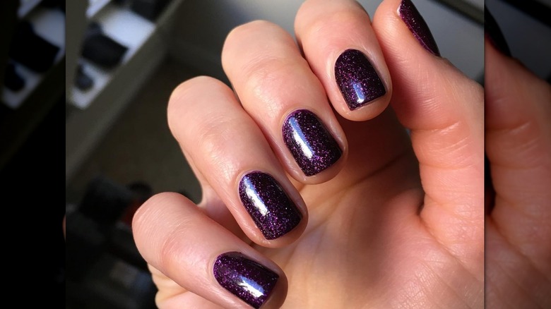 glittery purple and black nails