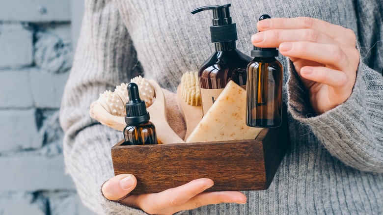 wooden box with lotions and soap