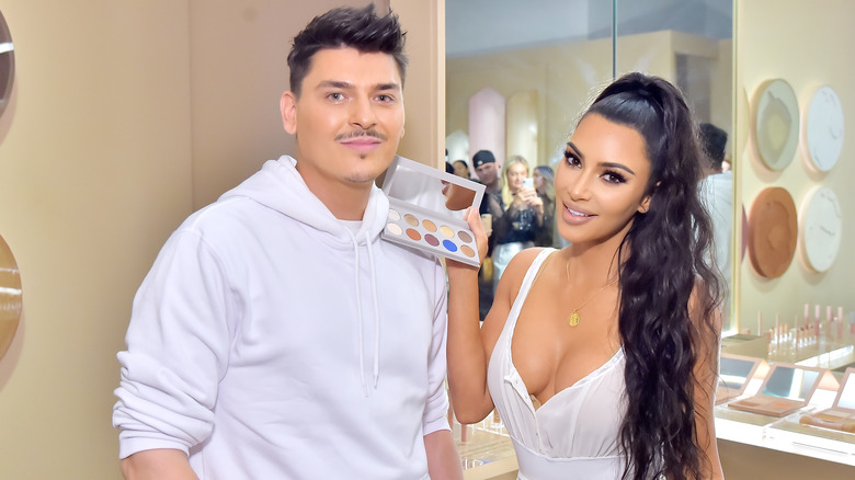 Mario Dedivanovic and Kim Kardashian smiling