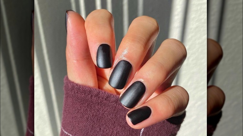 squoval nail shape with black polish