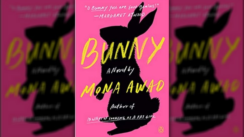 Black bunny silhouette on pink background 