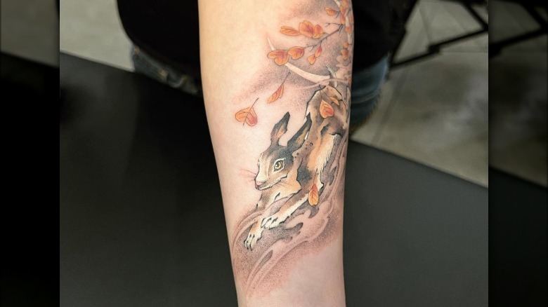 rabbit tattoo on forearm