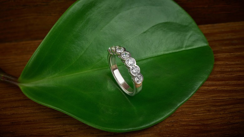 Lab grown diamond ring on a leaf 