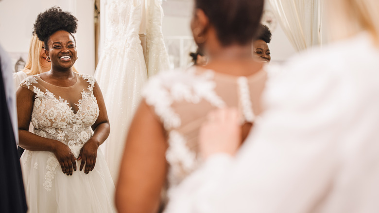 Bride wearing a secondhand wedding dress 