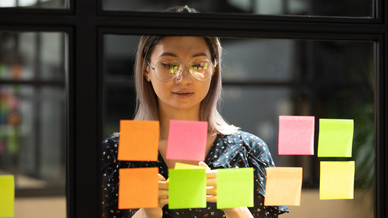 Woman making a vision board