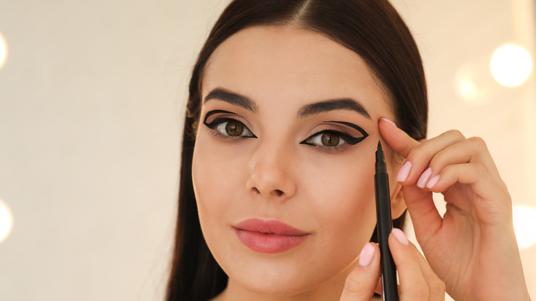 woman wearing black eyeliner