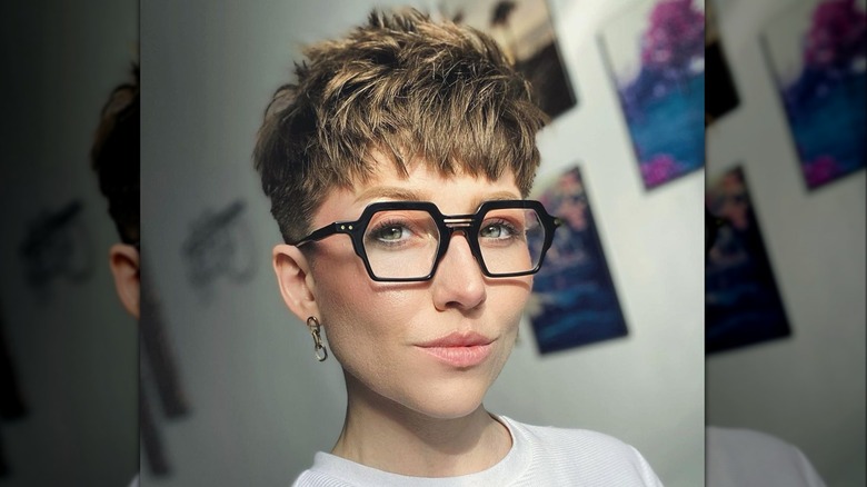 A woman with a undercut style pixie