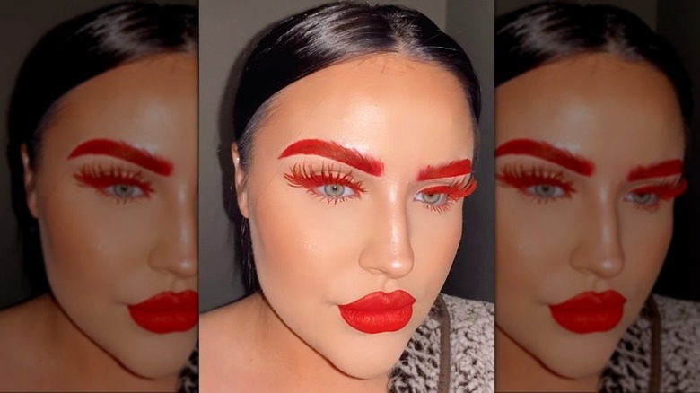 woman with Matching brows, lashes, and lipstick