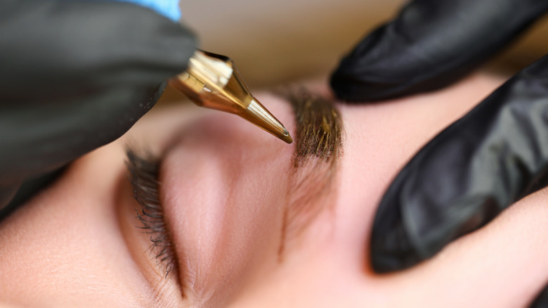 woman getting microblading