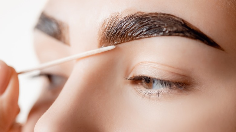 woman getting brow tinting