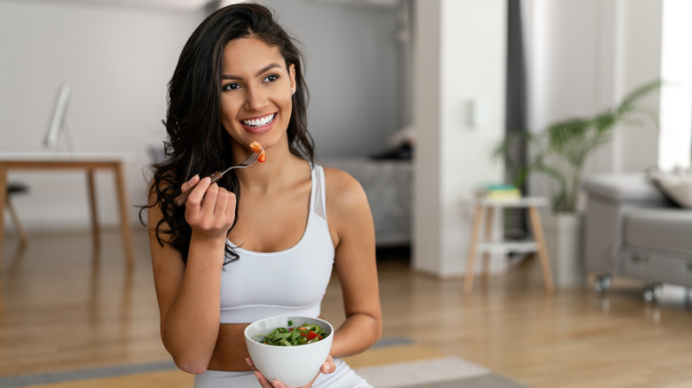 Woman eating a salad