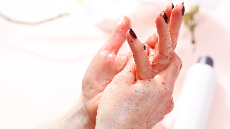 Woman scrubbing her hands