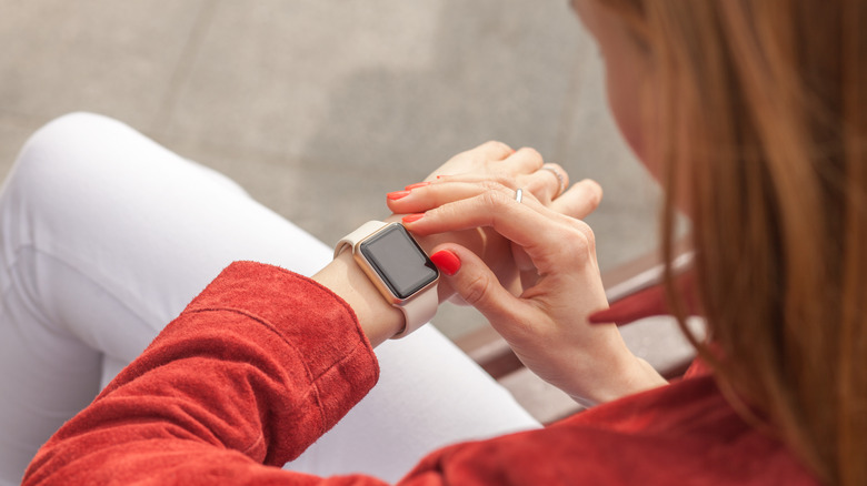 woman wearing smartwatch