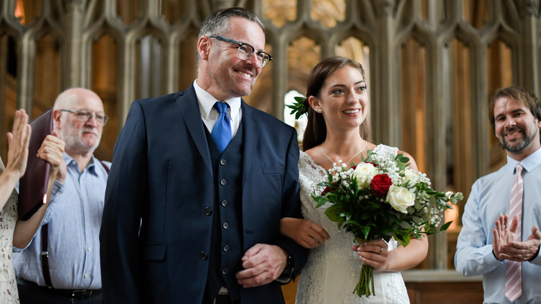 Father giving away the bride