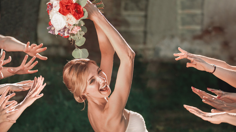 Bride throwing a bouquet 