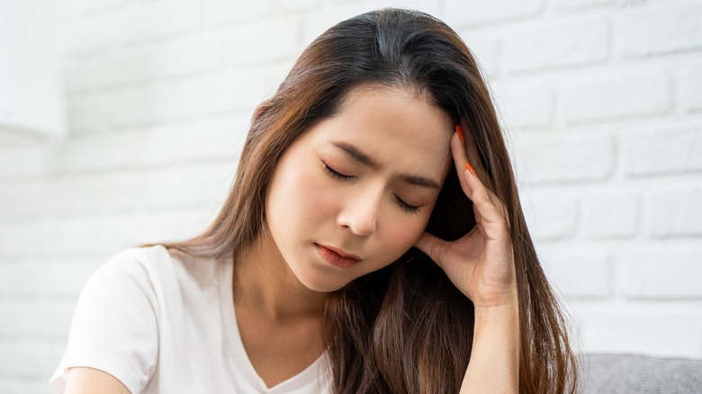 woman looking stressed 