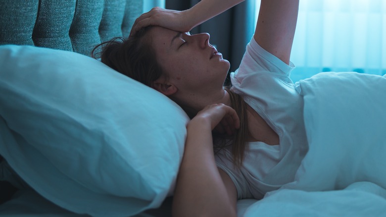 woman lying in bed