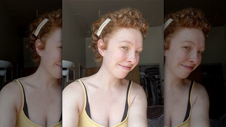 woman with barrette in curly hair