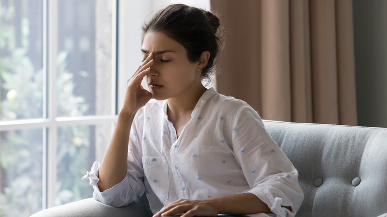 sad woman sitting alone