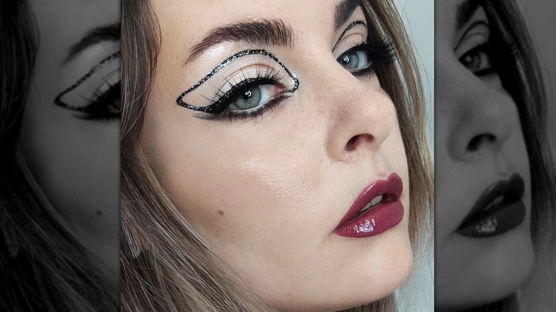 A woman wearing vintage style makeup