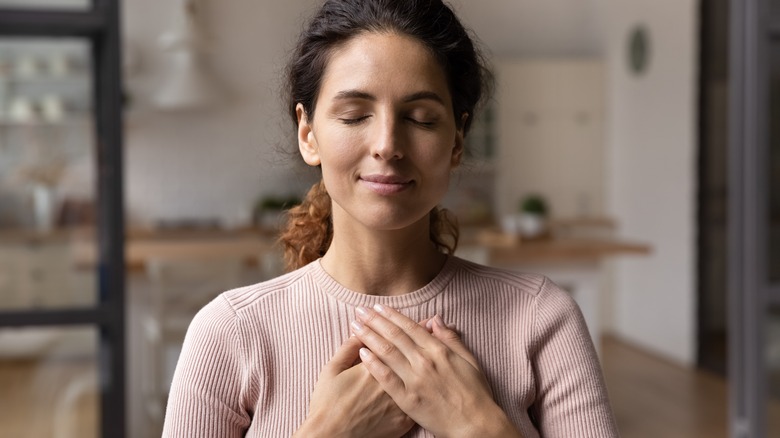 Woman practicing gratitude