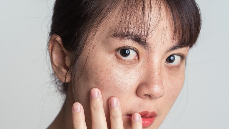 Woman with fake freckles