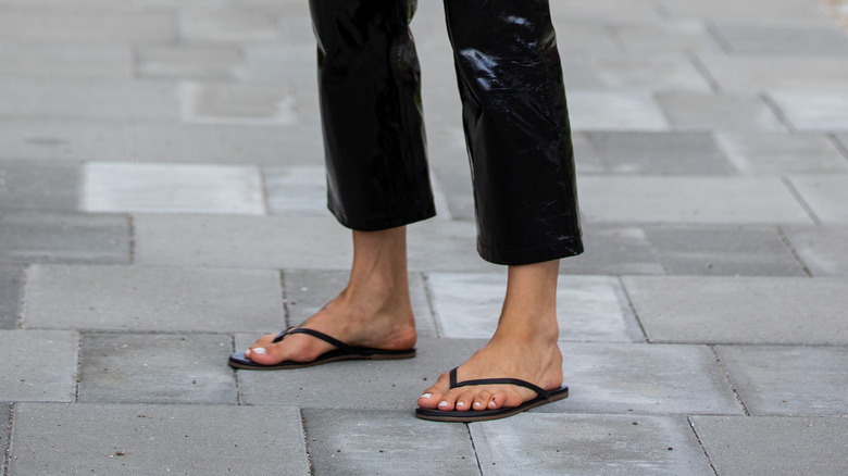 woman in basic flip flops