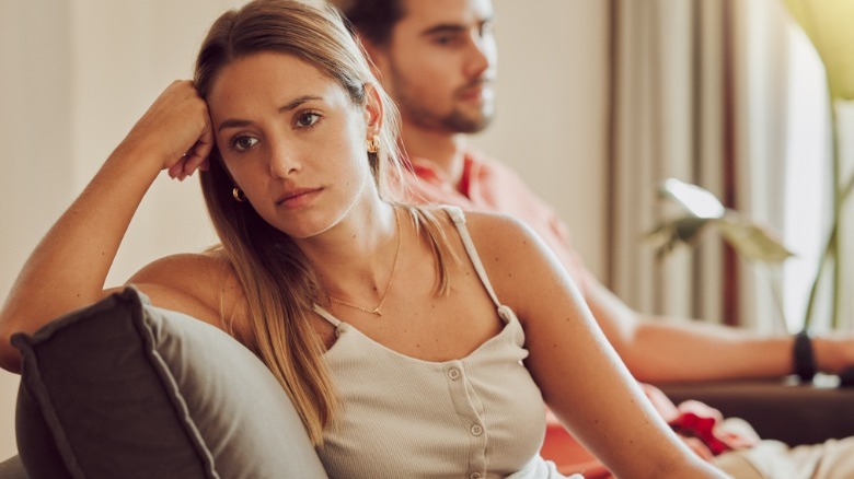 Fighting couple on couch