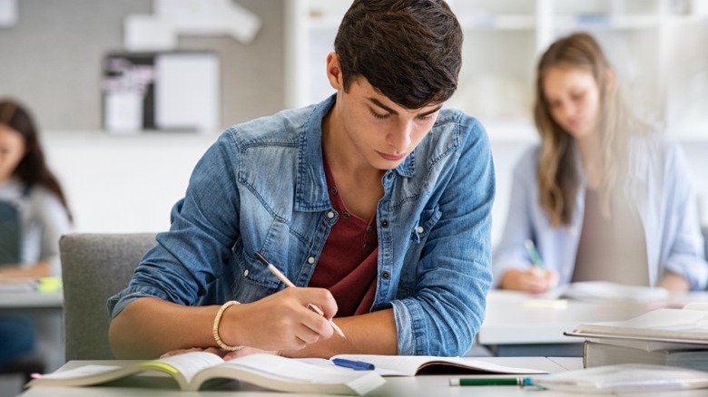 Young man taking a test