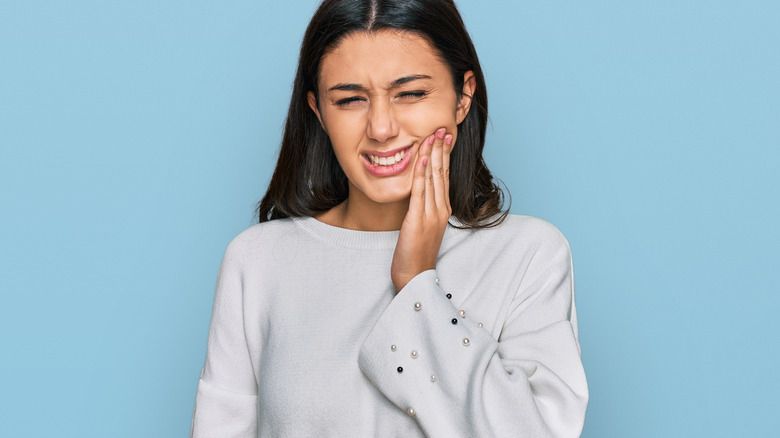 Woman with tooth pain