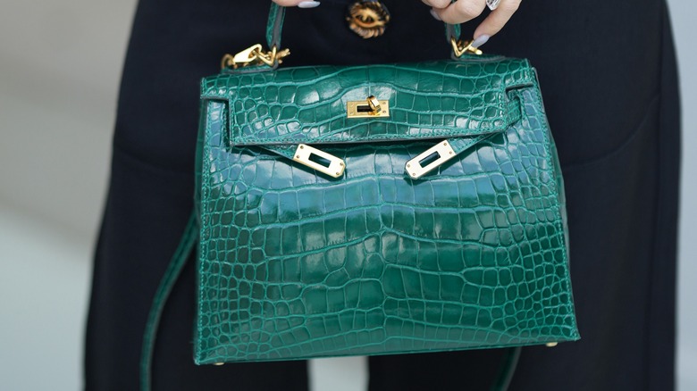 A crocodile-textured handbag